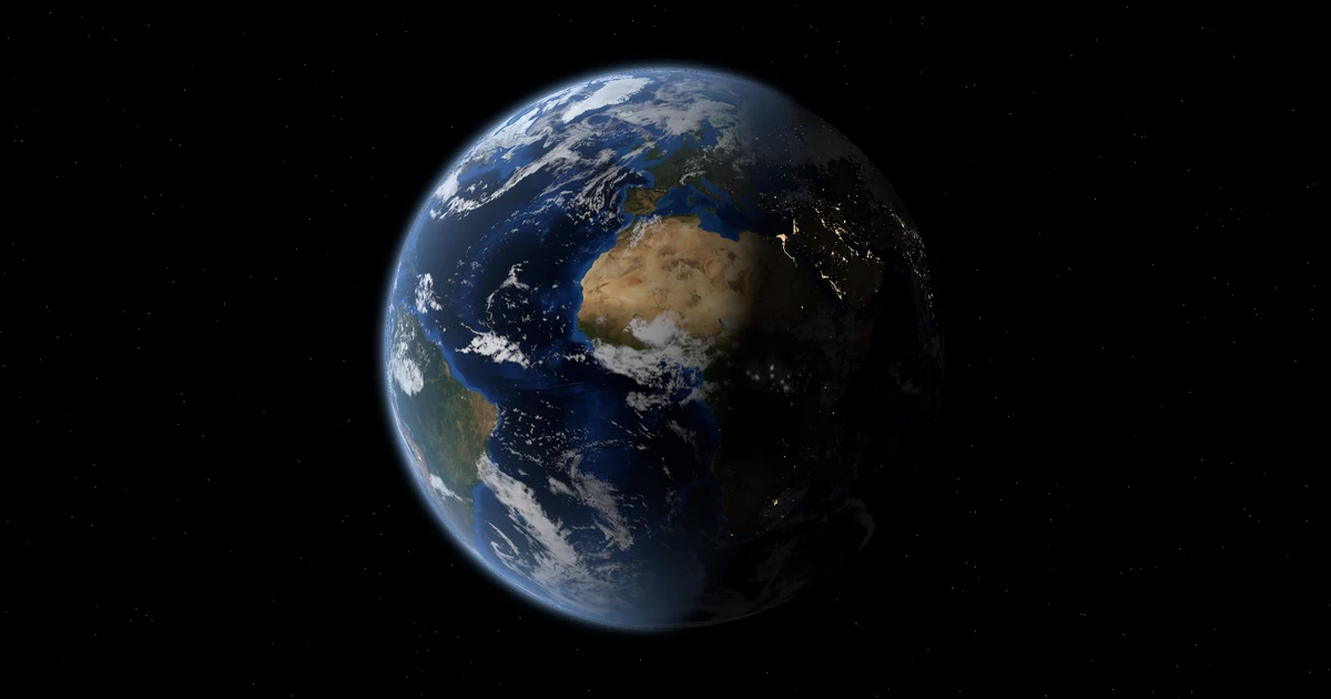 The Earth from space at dusk over Africa, with night falling in the east and lightning in the storm clouds over central Africa